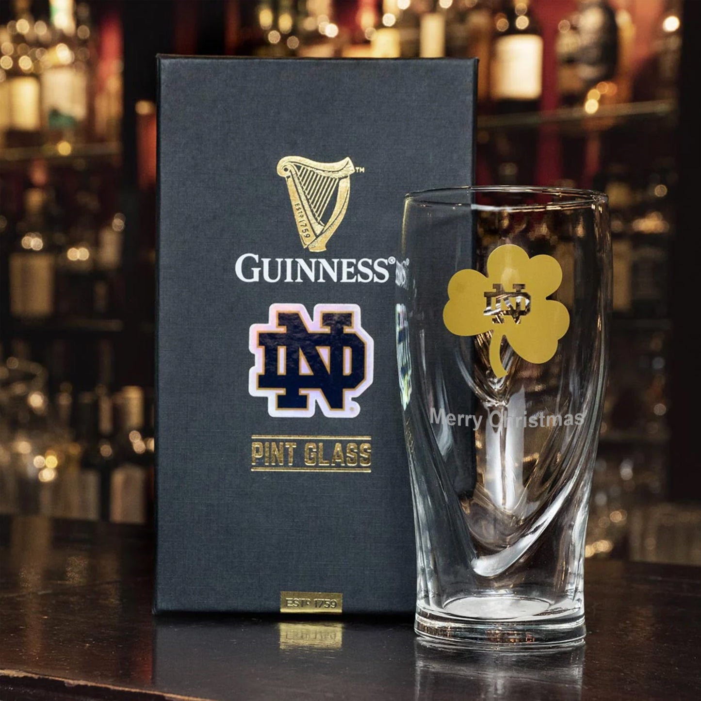 Guinness Notre Dame pint glass.
Revised sentence: Notre Dame Guinness Shamrock 16oz Pint Glass.